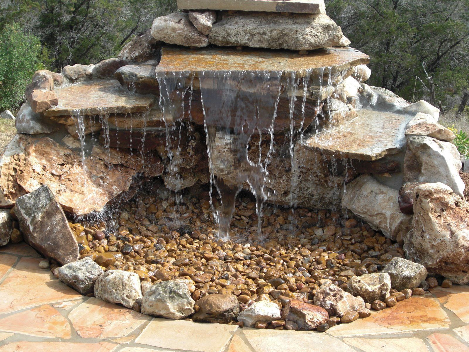 Directions for Installing a Pondless Waterfall Without Buying an Expensive Kit | Hunker -   18 garden design Pergola water features ideas