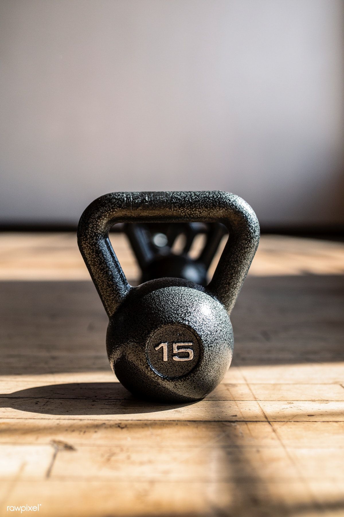 Download free image of Closeup black kettlebells in a row 2041709 -   fitness Equipment photography