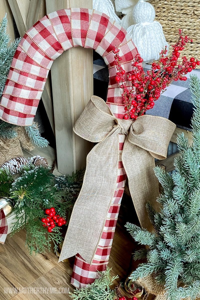 Dollar Tree Candy Cane Wreath - Mother Thyme -   18 diy christmas decorations dollar tree 2020 ideas