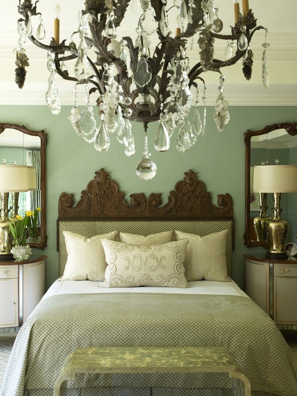 Mirrors above nightstands makes the room look bigger We